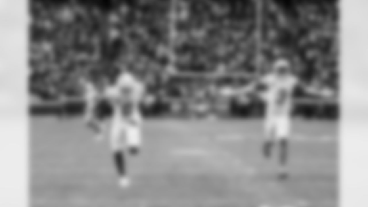 LB Daiyan Henley (0) and S Derwin James Jr. (3)