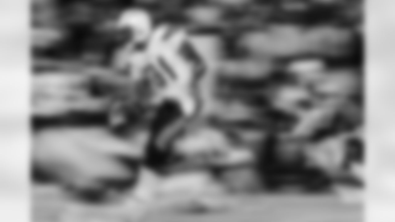 Relive the Chargers' postseason appearances through images from playoff games, highlighting the moments that defined the team in the NFL playoffs.