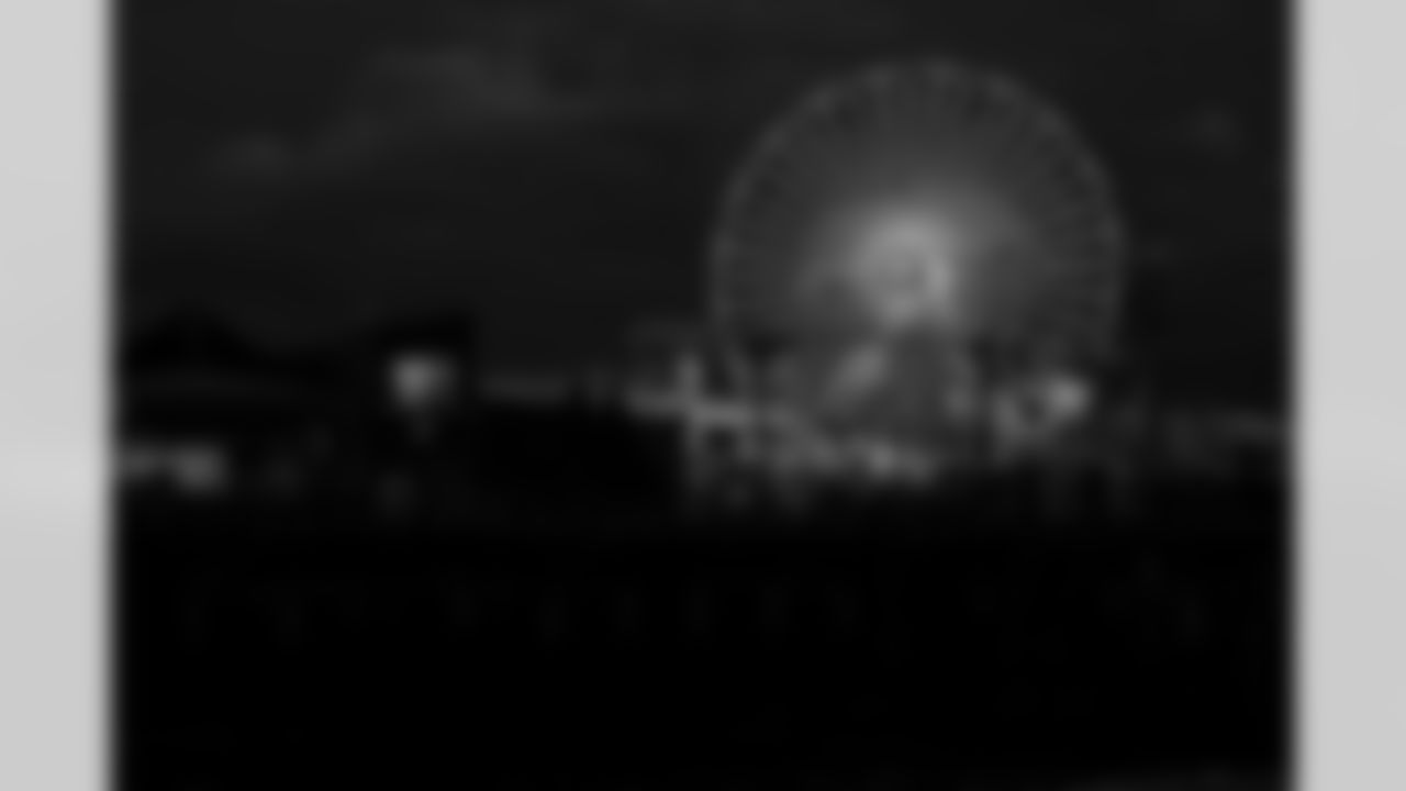 The ferris wheel is lit up for the Los Angeles Chargers on Tuesday, January 6, 2026 at Pacific Park in Santa Monica, CA.