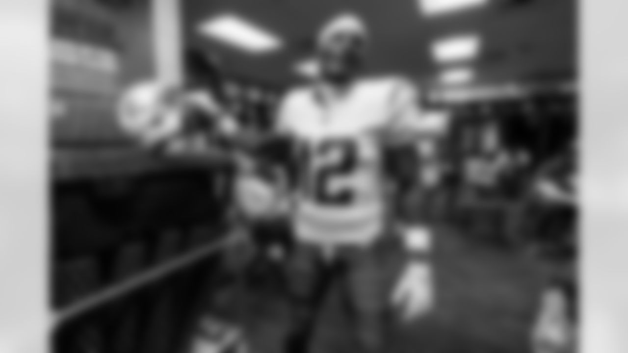 Check out the best shots from the Chargers Wild Card matchup against the Patriots!