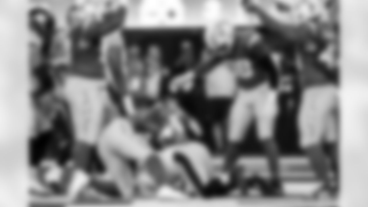 OLB Khalil Mack (52), DL Da'Shawn Hand (91), OLB Odafe Oweh (98) and OLB Tuli Tuipulotu (45)