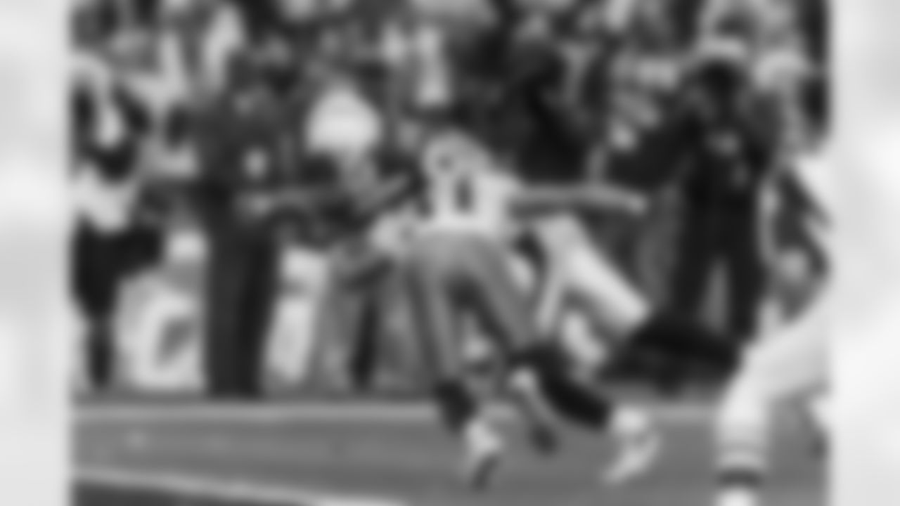 Relive the Chargers' postseason appearances through images from playoff games, highlighting the moments that defined the team in the NFL playoffs.