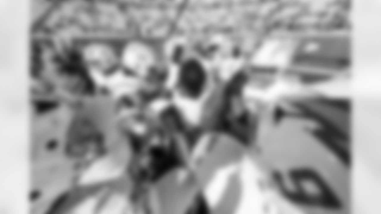 OL Jamaree Salyer (68), OLB Khalil Mack (52) and T Rashawn Slater (70)