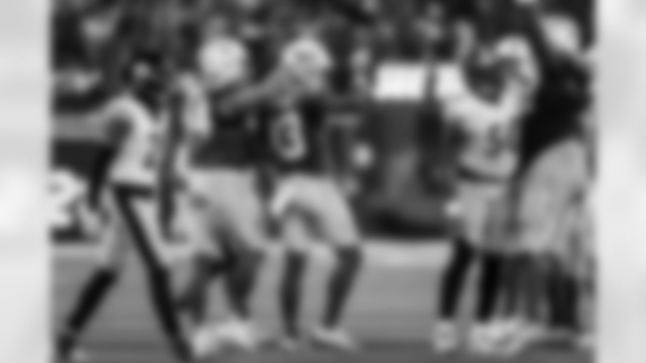 DL Scott Matlock (44) and WR Keenan Allen (13)