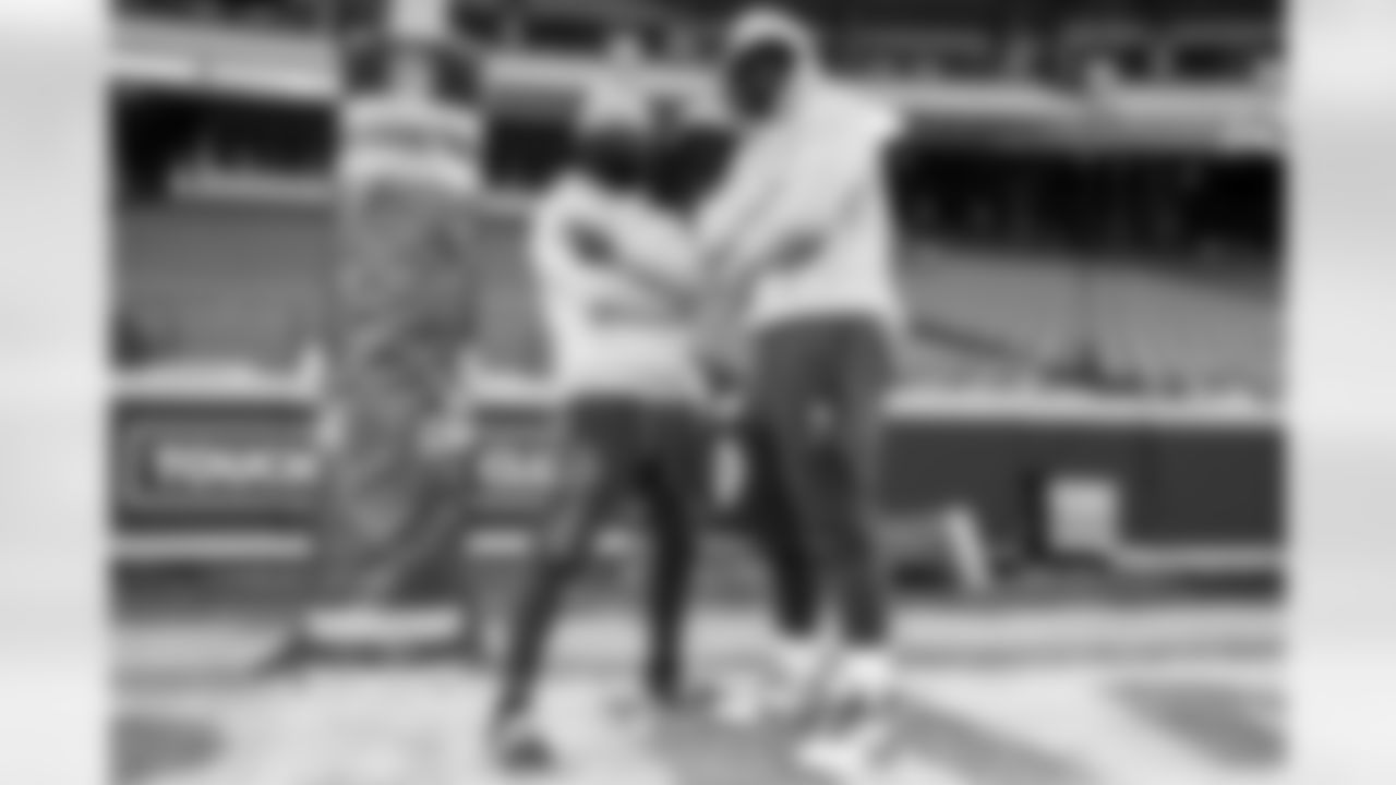 DL Justin Eboigbe (92) and CB Donte Jackson (26)