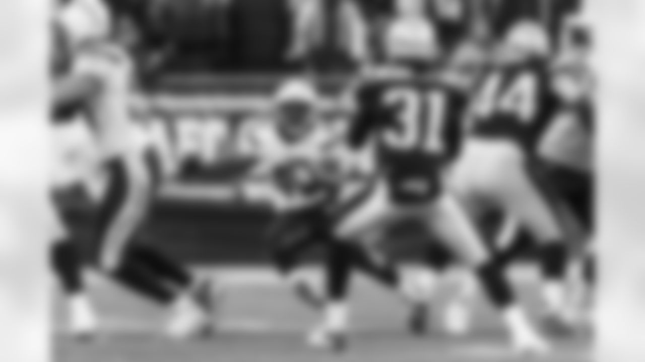 Relive the Chargers' postseason appearances through images from playoff games, highlighting the moments that defined the team in the NFL playoffs.