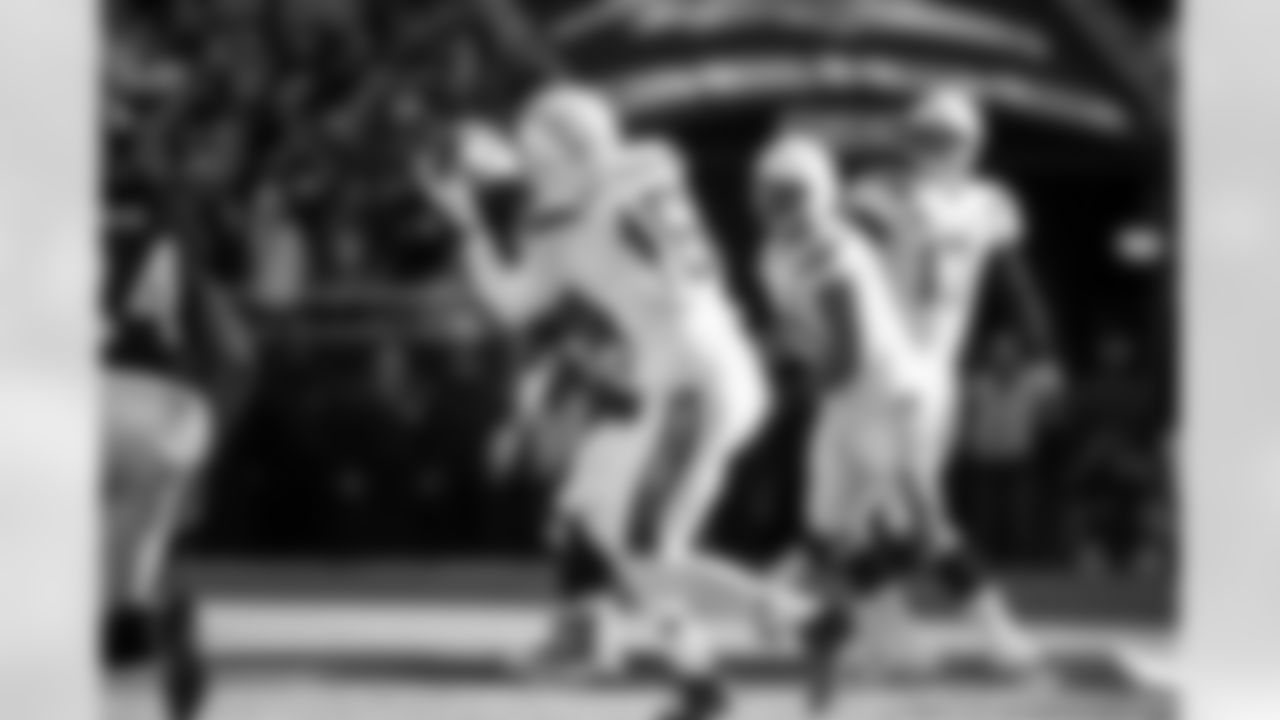 Relive the Chargers' postseason appearances through images from playoff games, highlighting the moments that defined the team in the NFL playoffs.