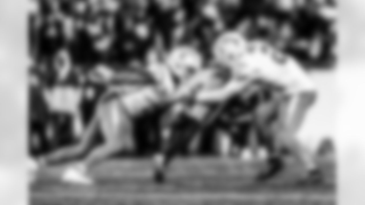 Take a look back at the Chargers Wild Card matchup with the Patriots in monochrome.