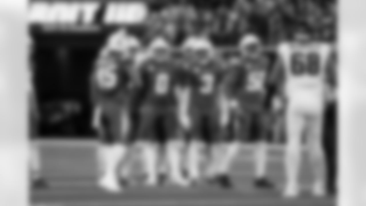 OLB Tuli Tuipulotu (45), LB Daiyan Henley (0), S Derwin James Jr. (3) and OLB Khalil Mack (52)