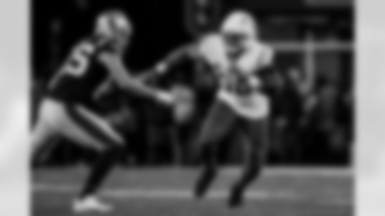 Check out the best shots from the Chargers Wild Card matchup against the Patriots!