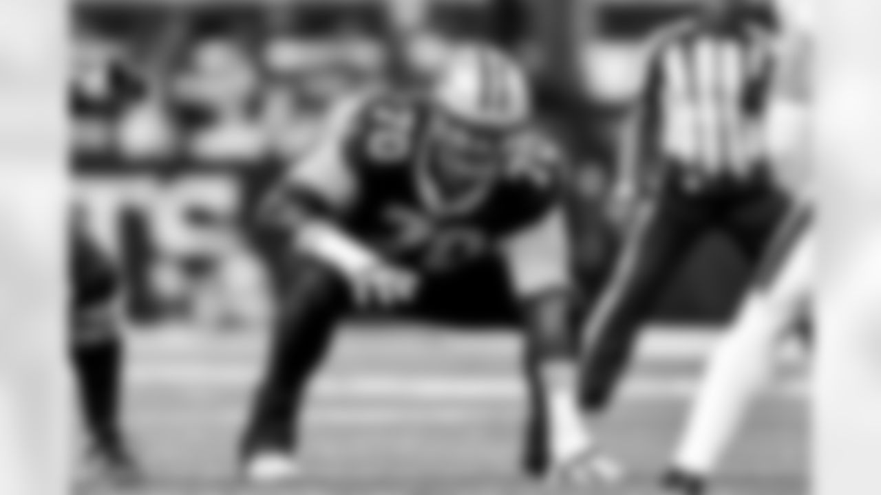 New Orleans Saints offensive tackle Trevor Penning (70) lines up in the first half during an NFL football game against the New England Patriots, Sunday, Oct. 12, 2025, in New Orleans. (AP Photo/Maria Lysaker)