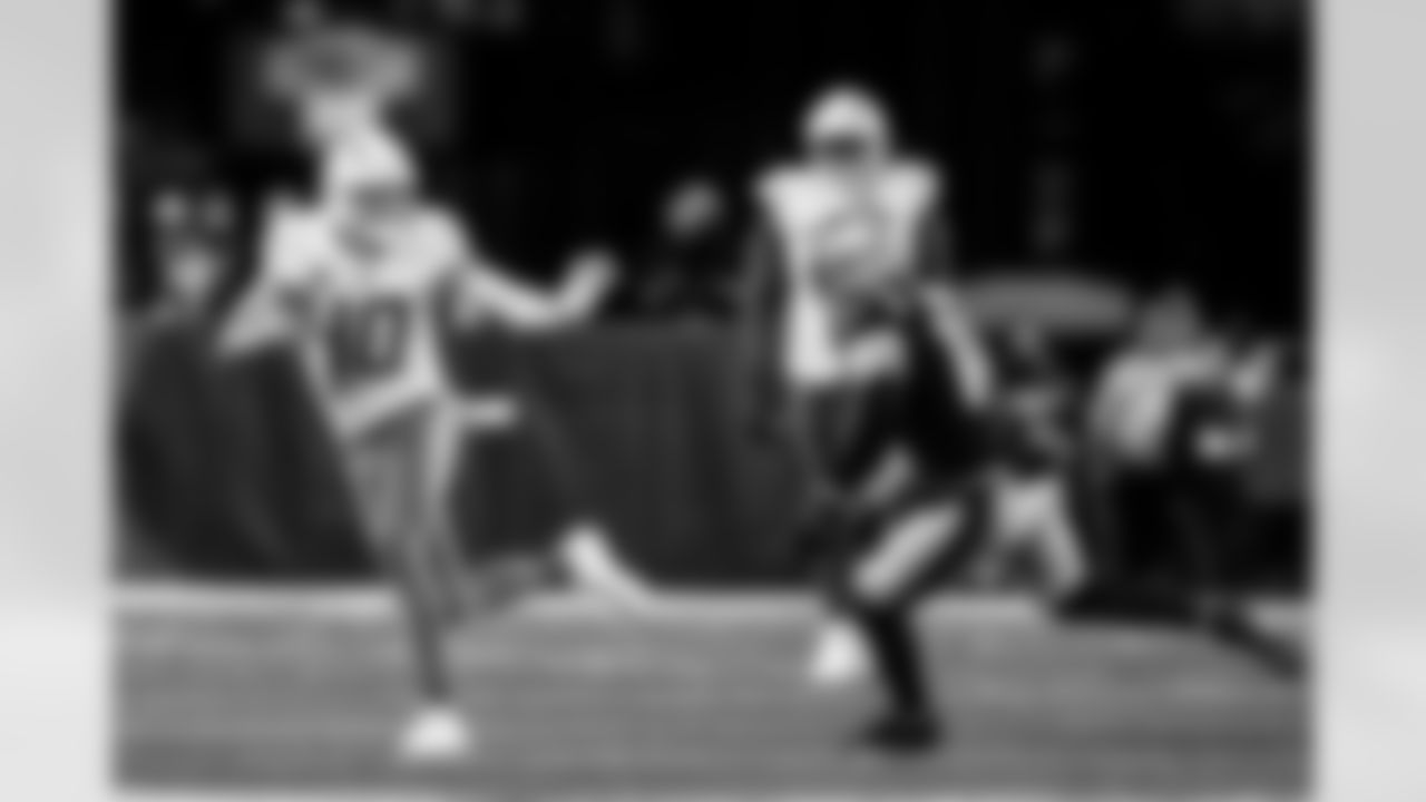 Check out the best shots from the Chargers Wild Card matchup against the Patriots!