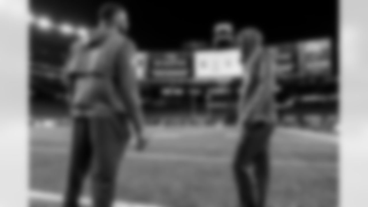 OLB Khalil Mack (52) and CB Cam Hart (20)