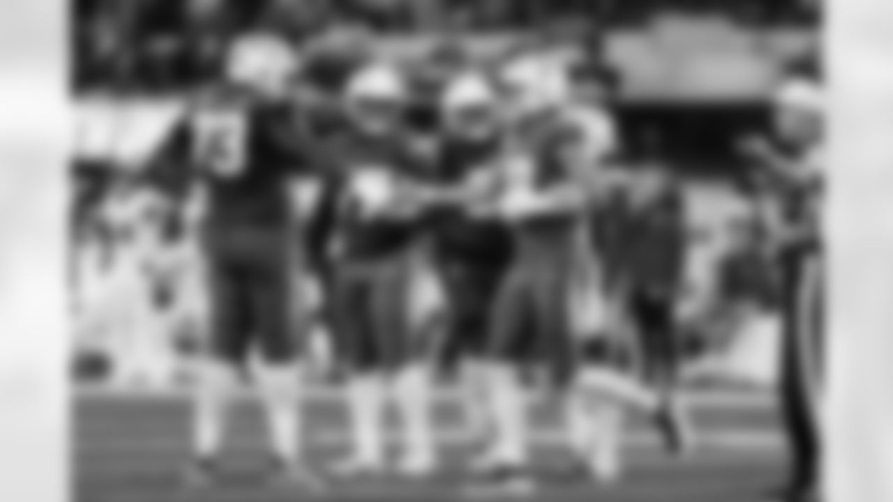 G Mekhi Becton (73) and QB Justin Herbert (10)