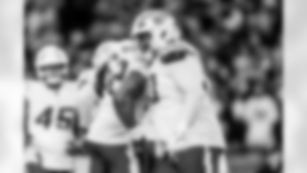 Check out the best shots from the Chargers Wild Card matchup against the Patriots!