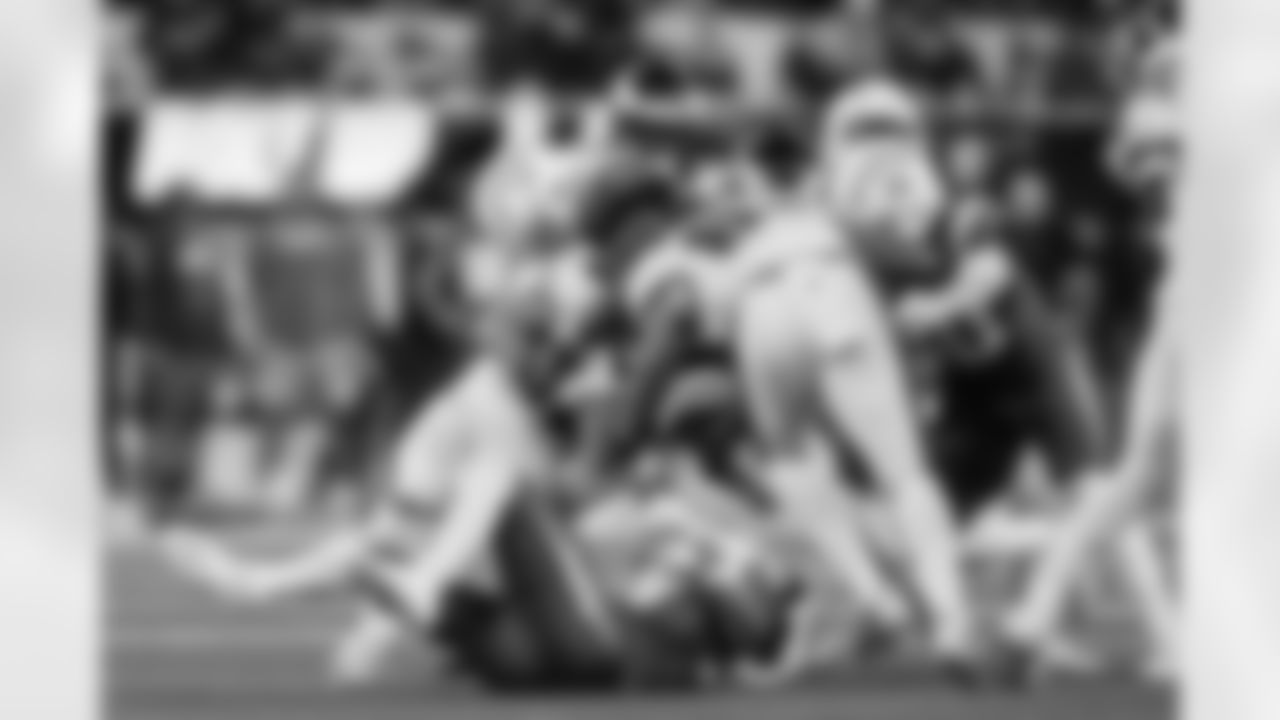 LB Del'Shawn Phillips (53) and DB Deane Leonard (33)