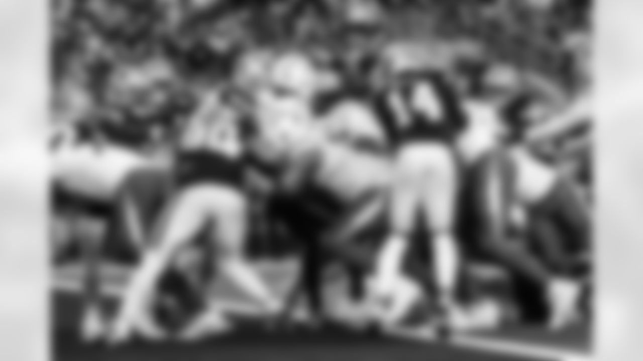 OL Austin Deculus (74) and QB Justin Herbert (10)