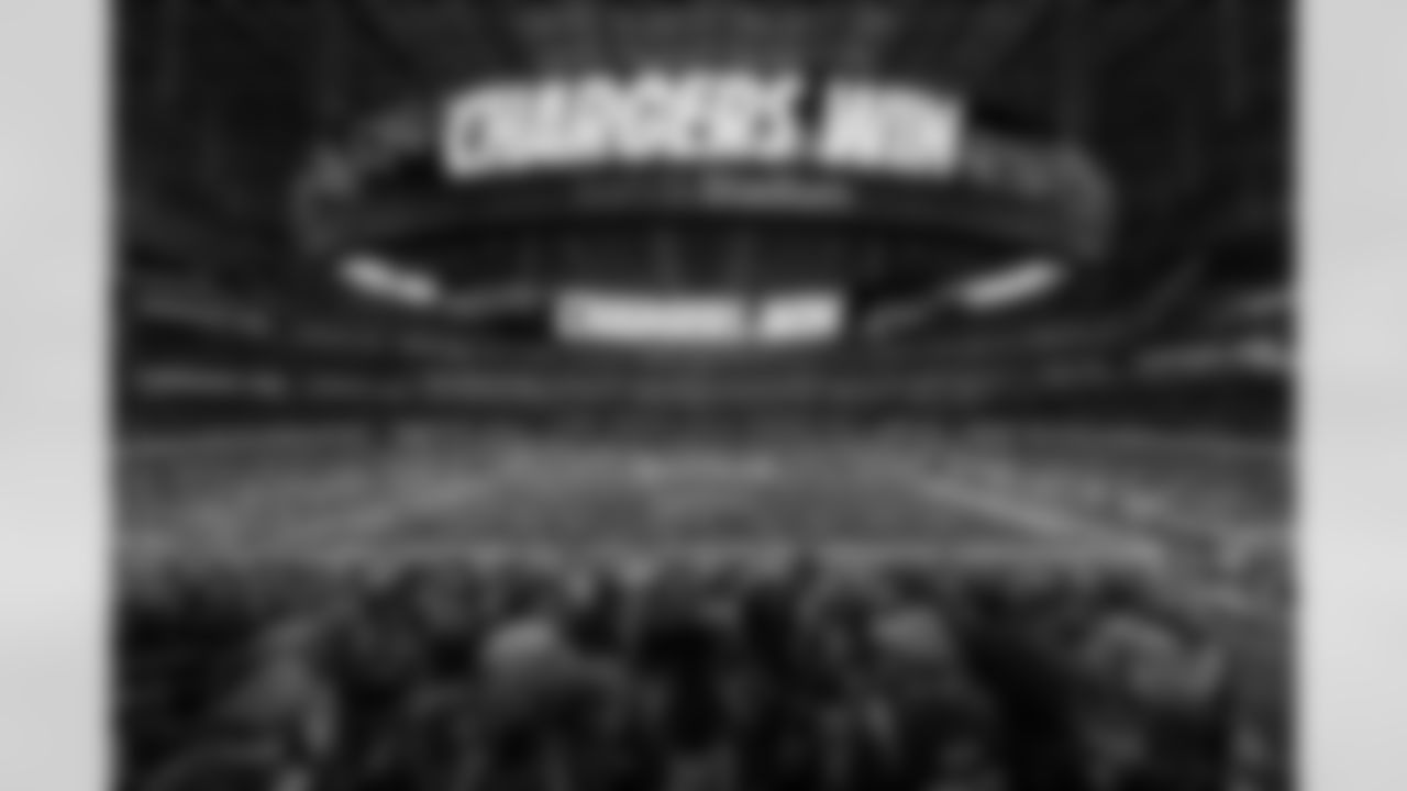 The Emotions of Victory - One more from Week 14 courtesy of our remote camera on Level 3 at the 50-yard line at SoFi. Remotes allow us to get multiple angles of the same moment, and this is happening at the exact same time as the photo above. When it became apparent that Jefferson was going to celebrate towards me, I put the remote camera trigger on my short lens camera so the remote would fire any time I hit the shutter button. It's a cool moment that shows all the emotions of the ending — fans celebrating, others in disbelief and the 'Chargers Win' graphic on the Infinity Screen.
