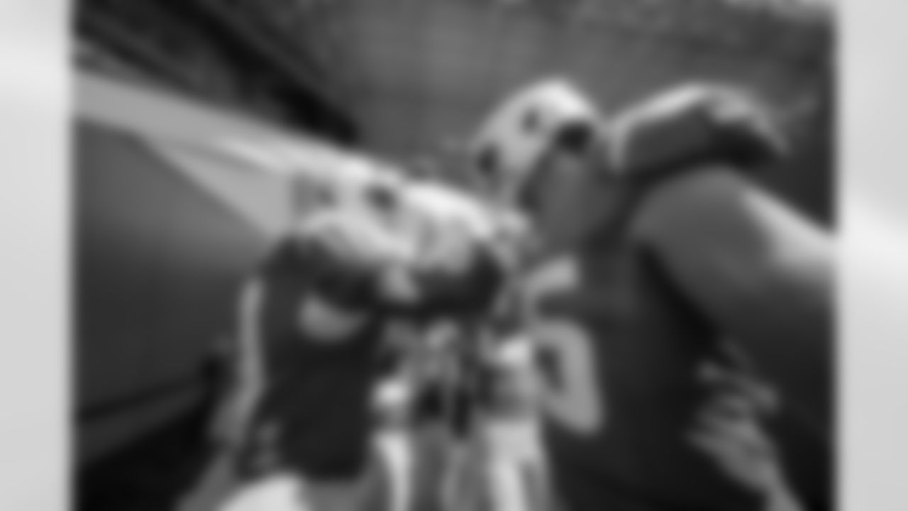 RB Nyheim Hines (31) and WR Ladd McConkey (15)