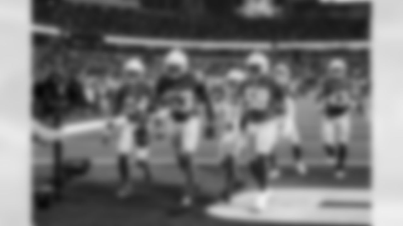 CB Benjamin St-Juste (24), LB Del'Shawn Phillips (53) and LB Marlowe Wax (58)