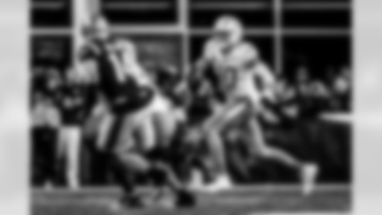 Take a look back at the Chargers Wild Card matchup with the Patriots in monochrome.