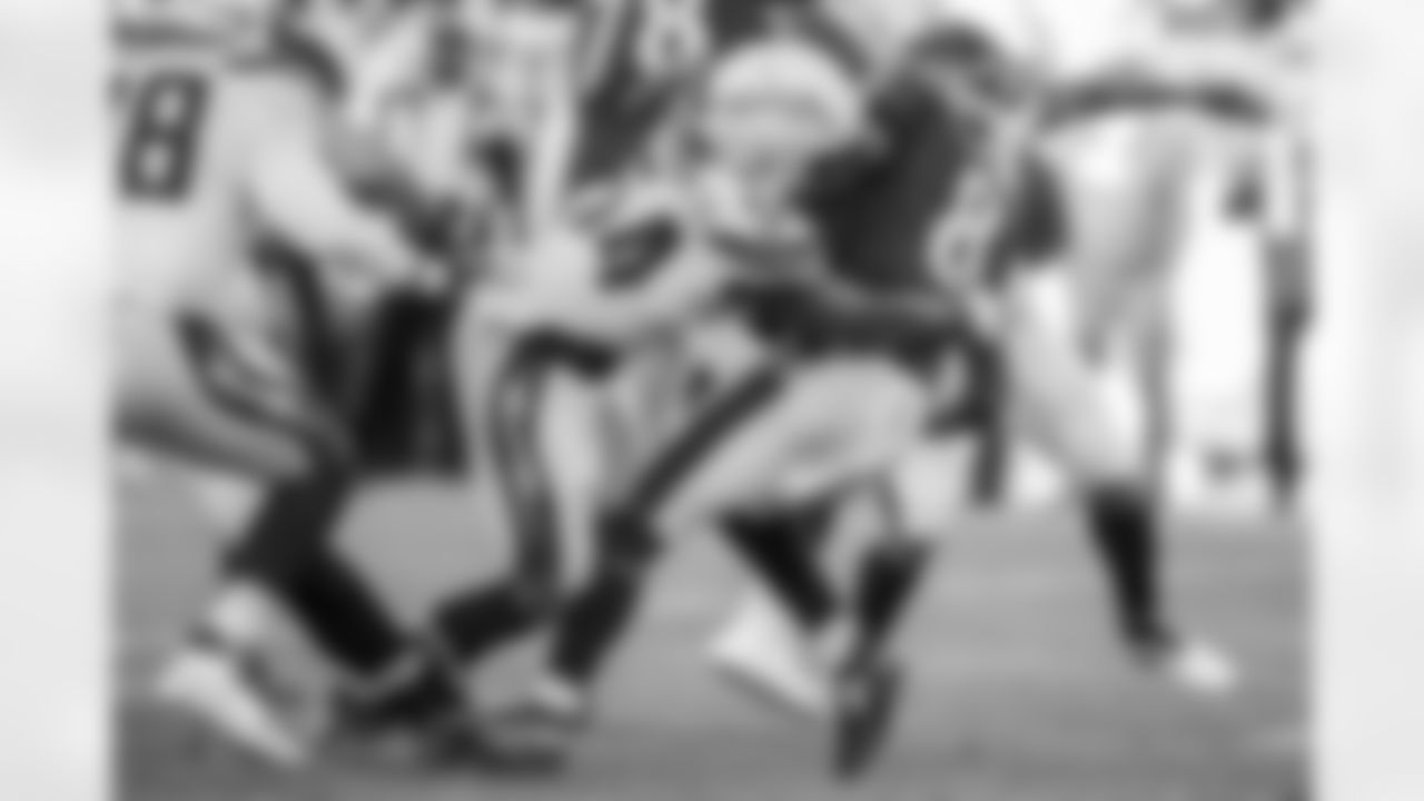 Relive the Chargers' postseason appearances through images from playoff games, highlighting the moments that defined the team in the NFL playoffs.