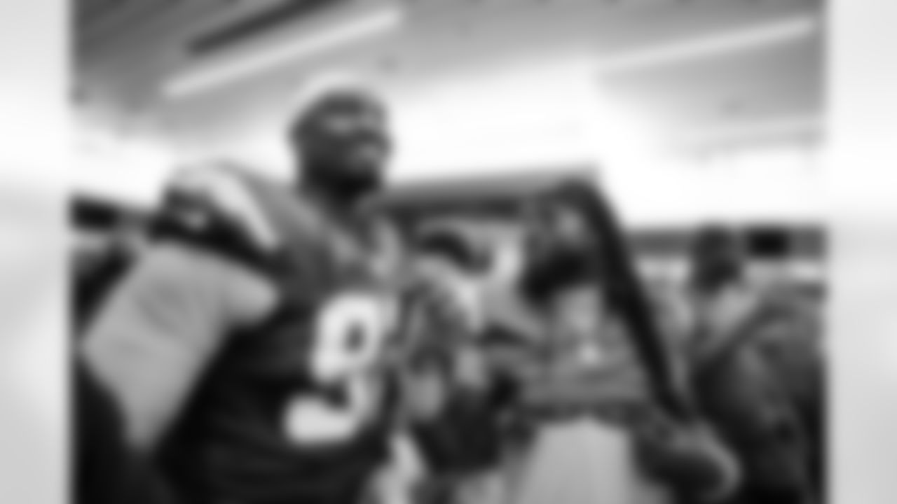 DL Justin Eboigbe (92) and CB Donte Jackson (26)