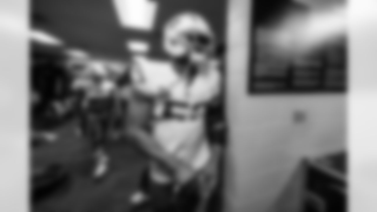 Check out the best shots from the Chargers Wild Card matchup against the Patriots!