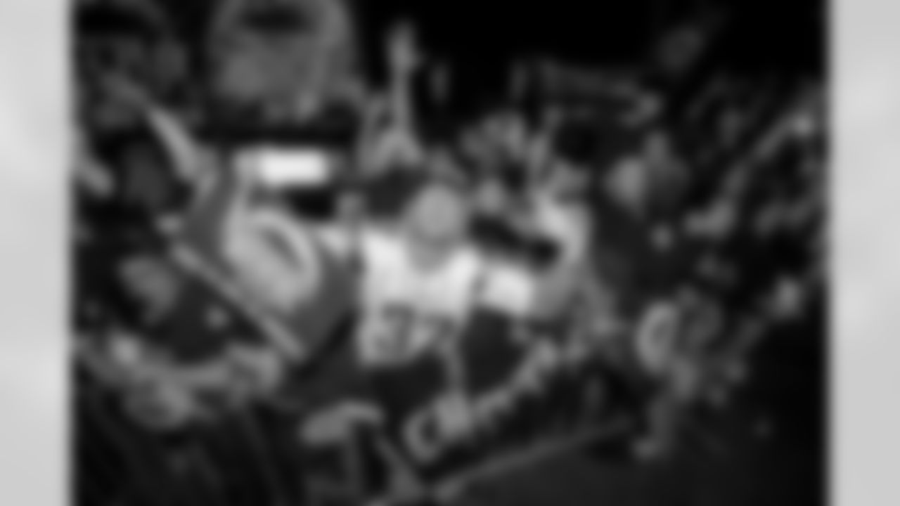 Relive the Chargers' postseason appearances through images from playoff games, highlighting the moments that defined the team in the NFL playoffs.