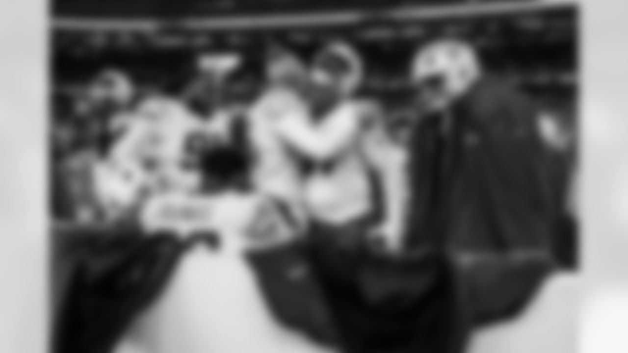 Check out the best shots from the Chargers Wild Card matchup against the Patriots!