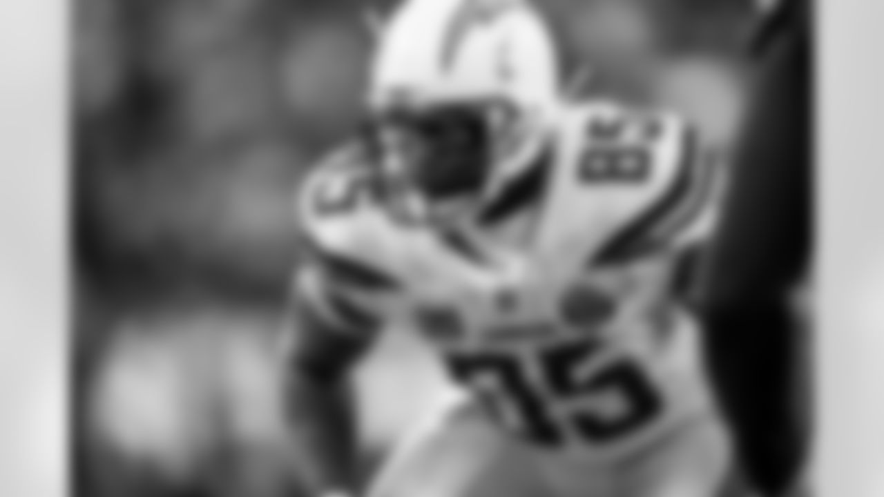 Relive the Chargers' postseason appearances through images from playoff games, highlighting the moments that defined the team in the NFL playoffs.