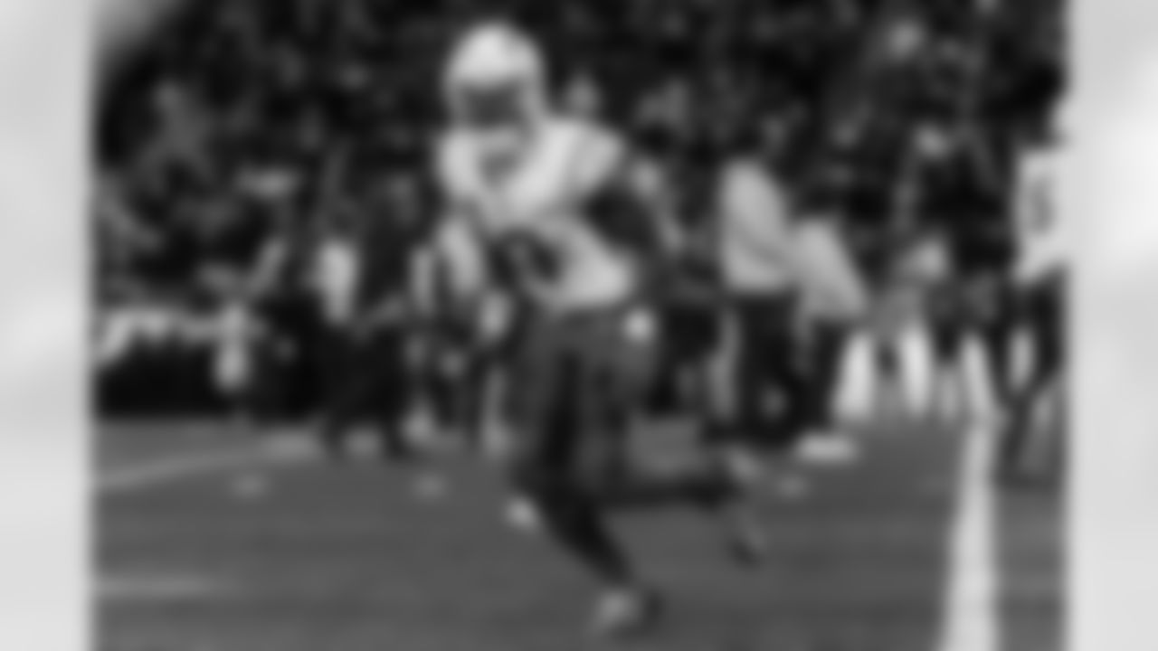 Check out the best shots from the Chargers Wild Card matchup against the Patriots!