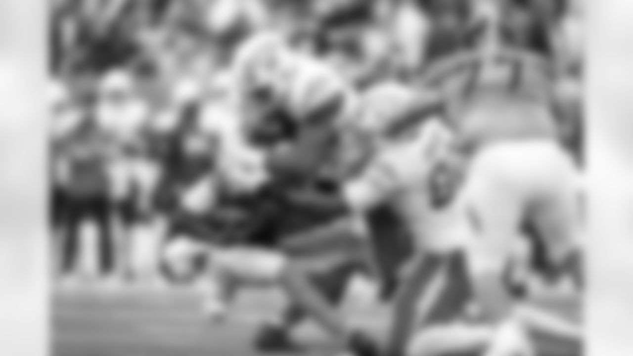 OLB Odafe Oweh (98) and DL Justin Eboigbe (92)