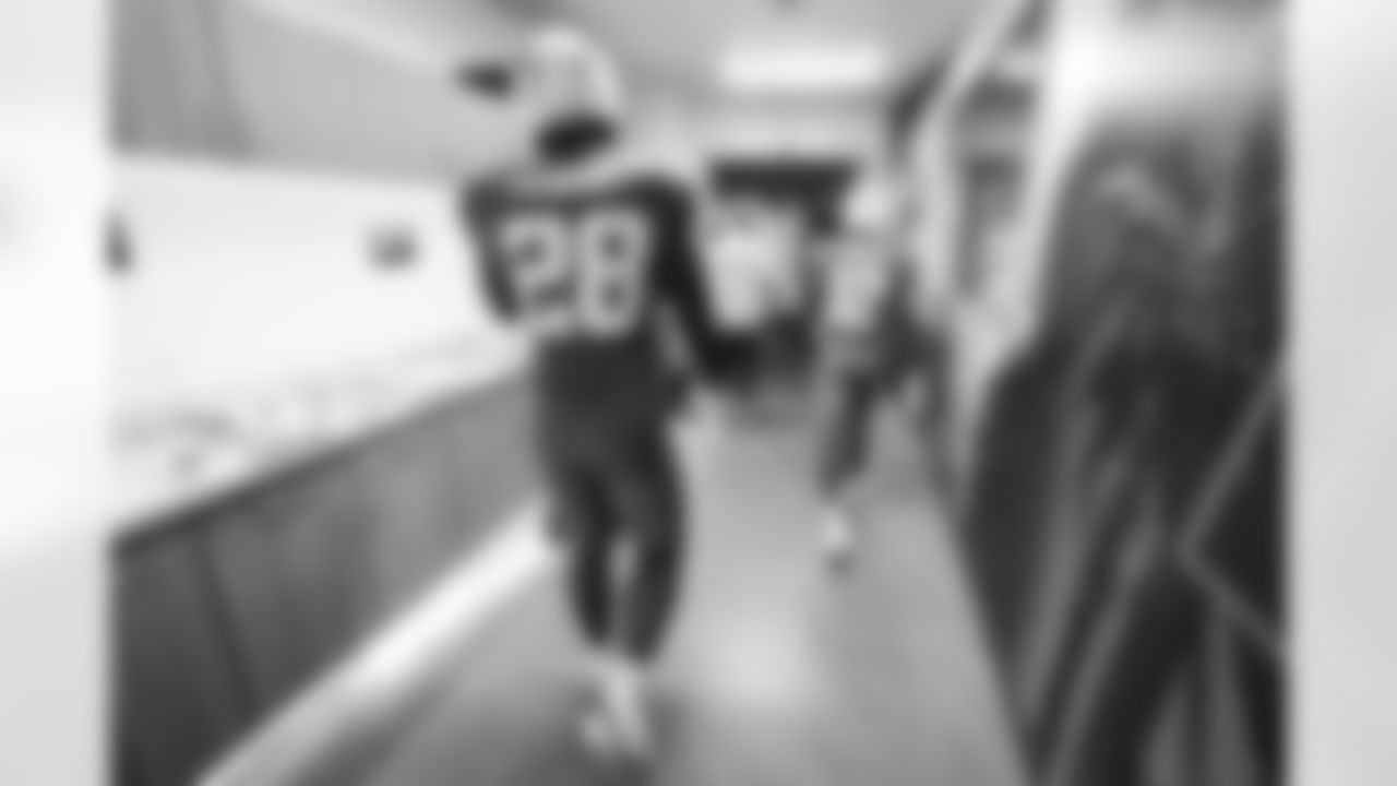 RB Hassan Haskins (28) and WR Derius Davis (12)