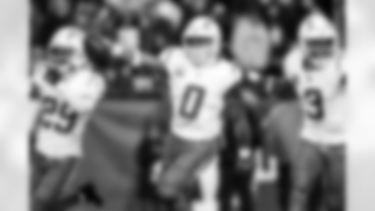 LB Daiyan Henley (0) and S Derwin James Jr. (3)