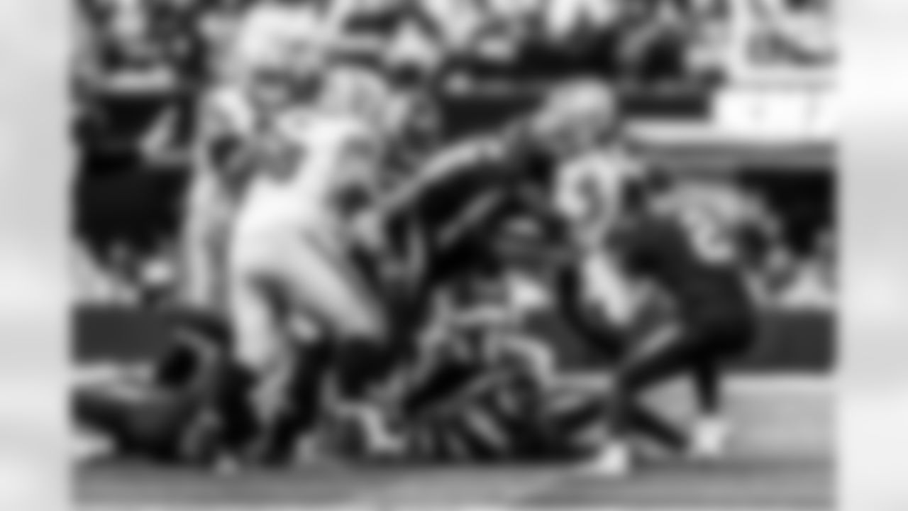 Take a look back at the Chargers Week 13 matchup with the Raiders in monochrome.