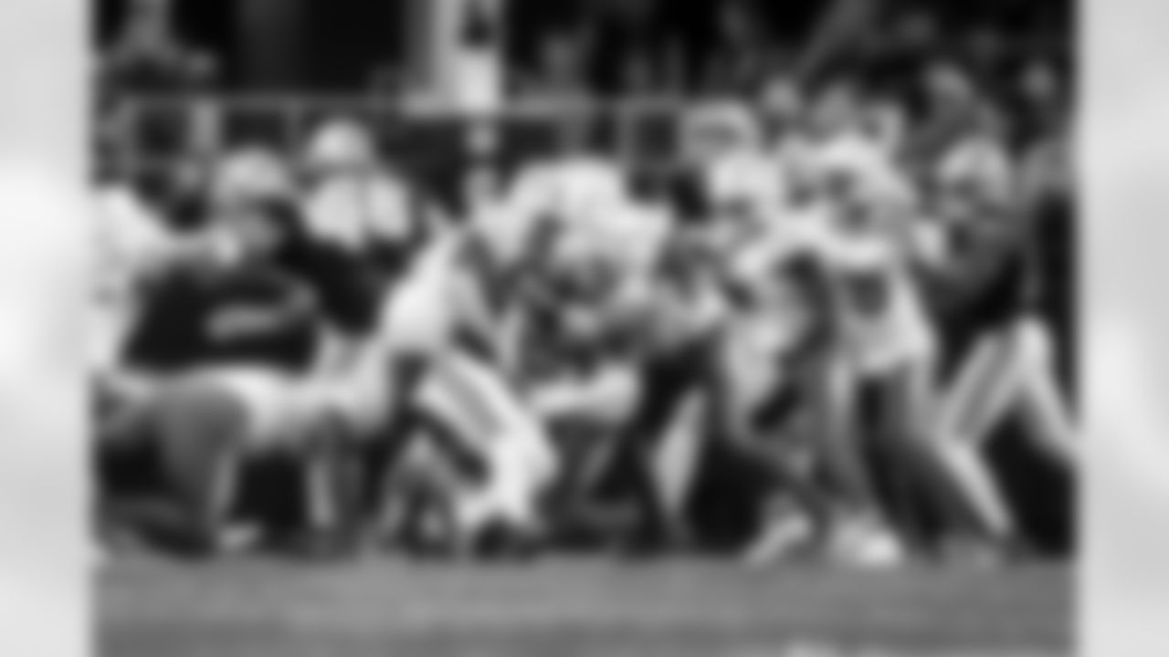 DL Teair Tart (90), LB Daiyan Henley (0) and S Derwin James Jr. (3)