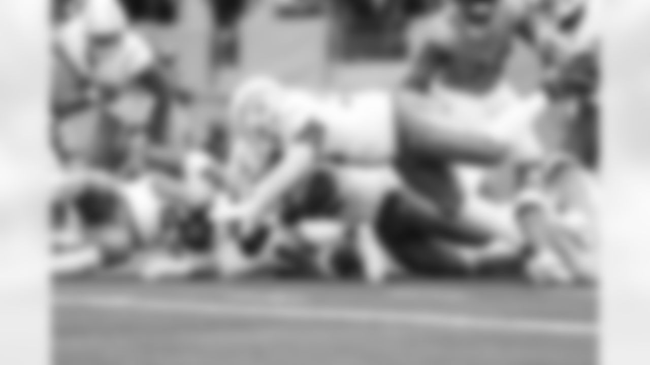 DL Naquan Jones (96) and DL Justin Eboigbe (92)