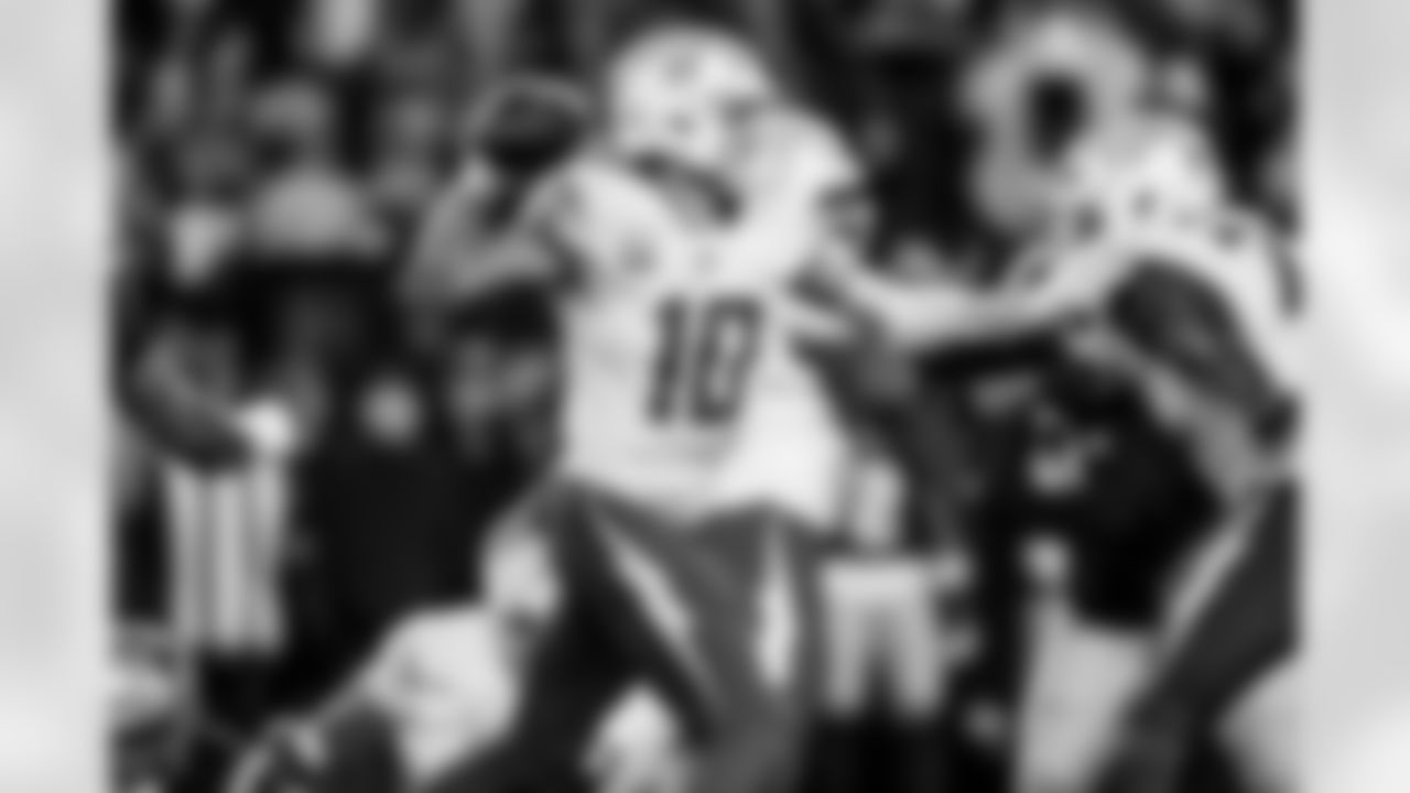 Check out the best shots from the Chargers Wild Card matchup against the Patriots!