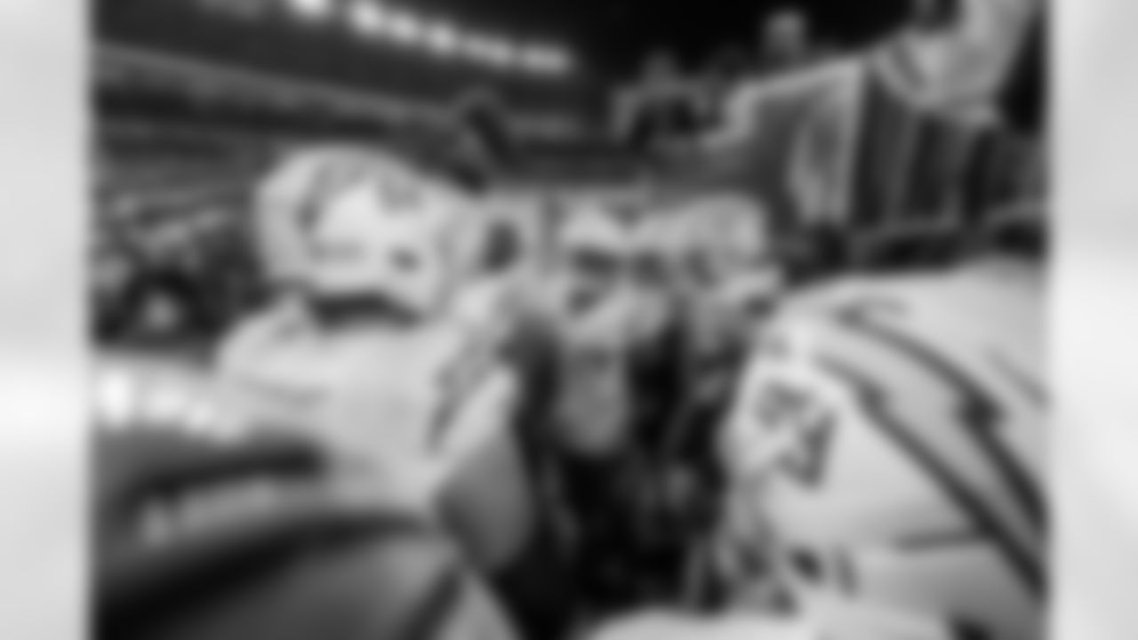 Check out the best shots from the Chargers Wild Card matchup against the Patriots!