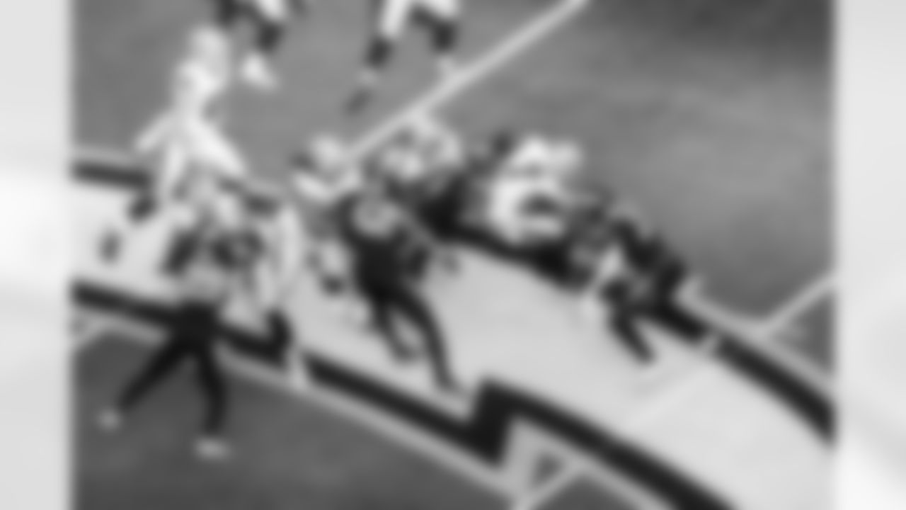 S Derwin James Jr. (3) and LB Daiyan Henley (0)