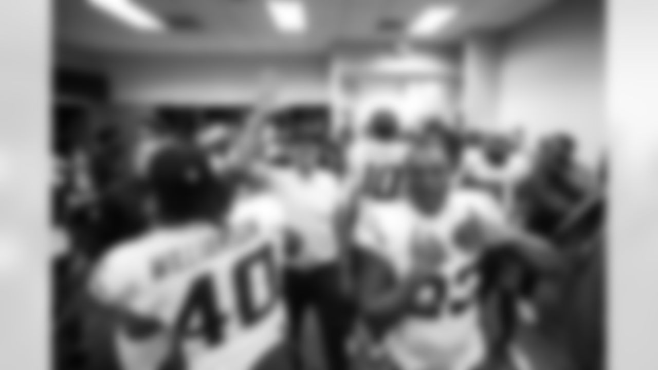 S Kendall Williamson (40), Head Coach Jim Harbaugh and S Tony Jefferson (23)