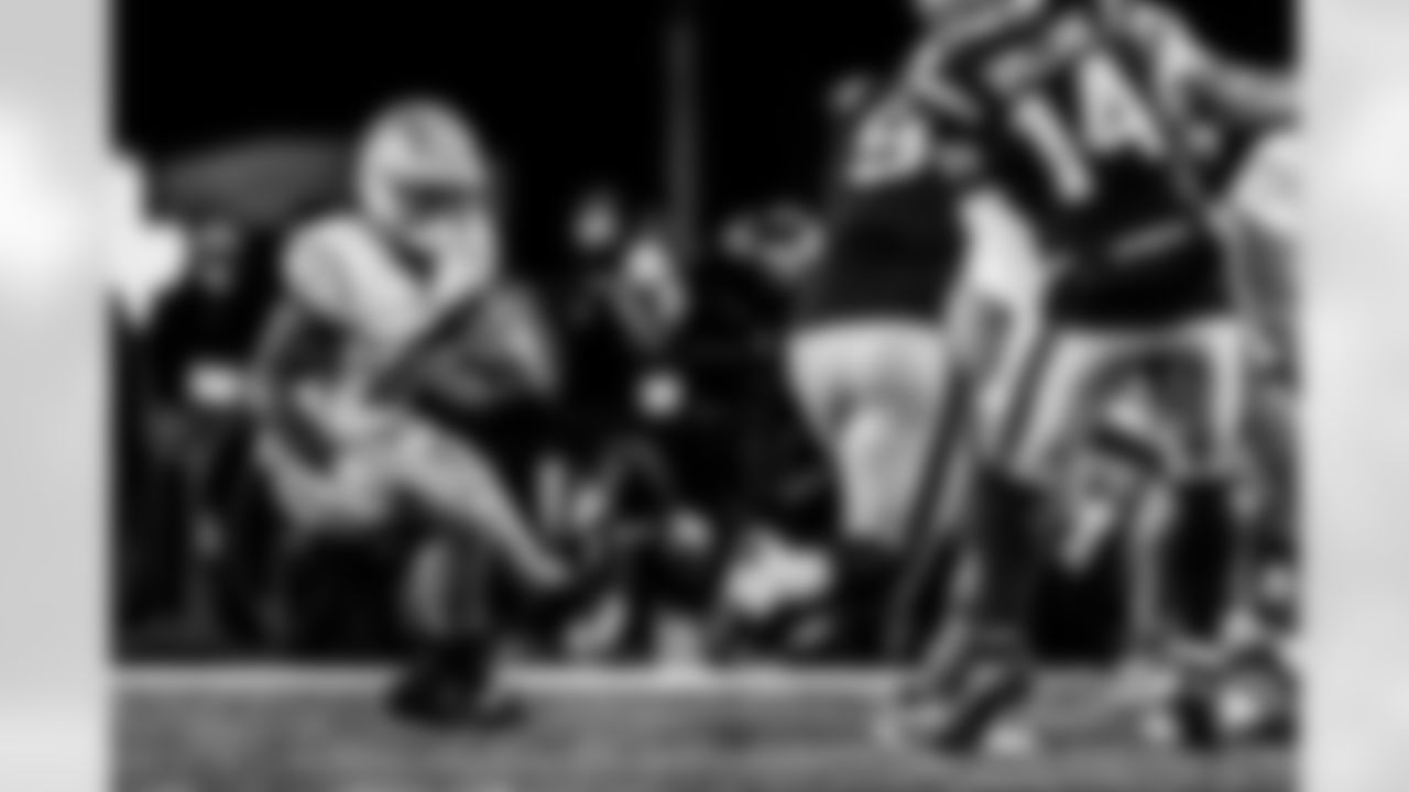 Take a look back at the Chargers Wild Card matchup with the Patriots in monochrome.