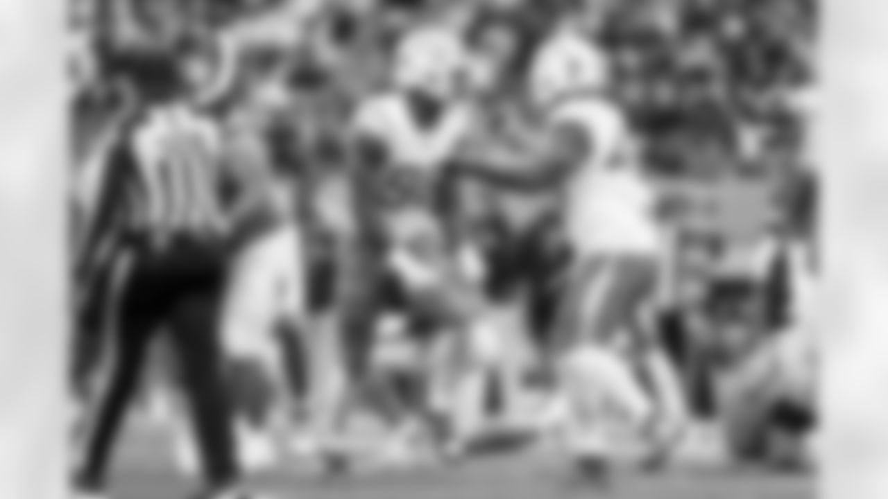 OLB Odafe Oweh (98) and OLB Tuli Tuipulotu (45)