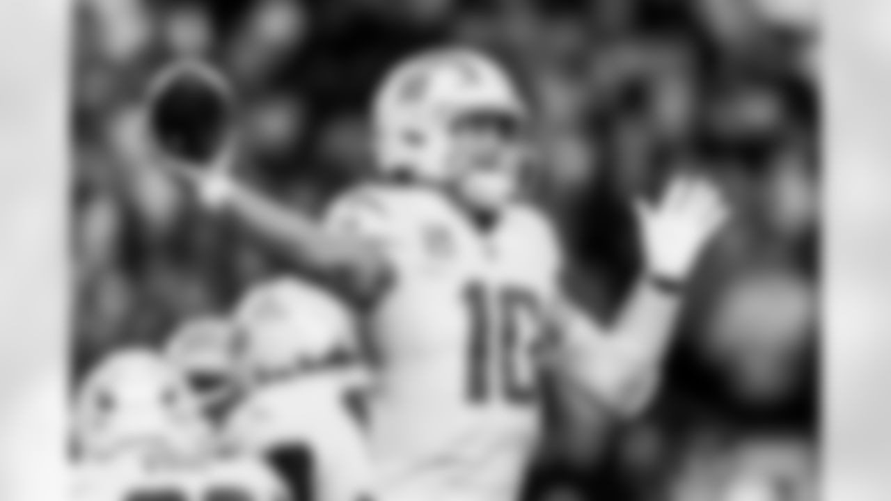 Check out the best shots from the Chargers Wild Card matchup against the Patriots!