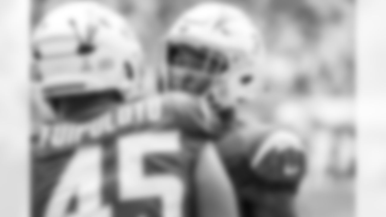 OLB Tuli Tuipulotu (45) and S Derwin James Jr. (3)