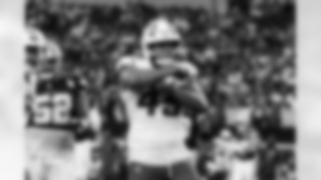 Chargers OLB Tuli Tuipulotu (#45) in action during their Pro Bowl season.