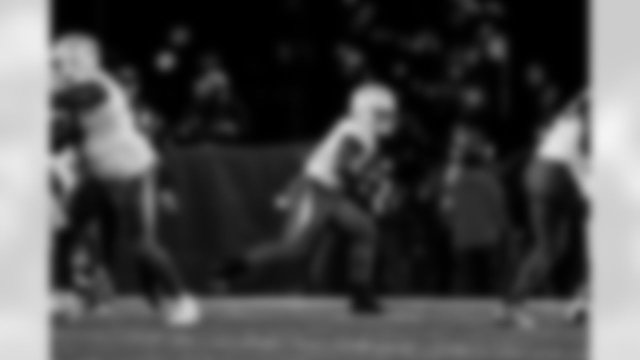 Check out the best shots from the Chargers Wild Card matchup against the Patriots!