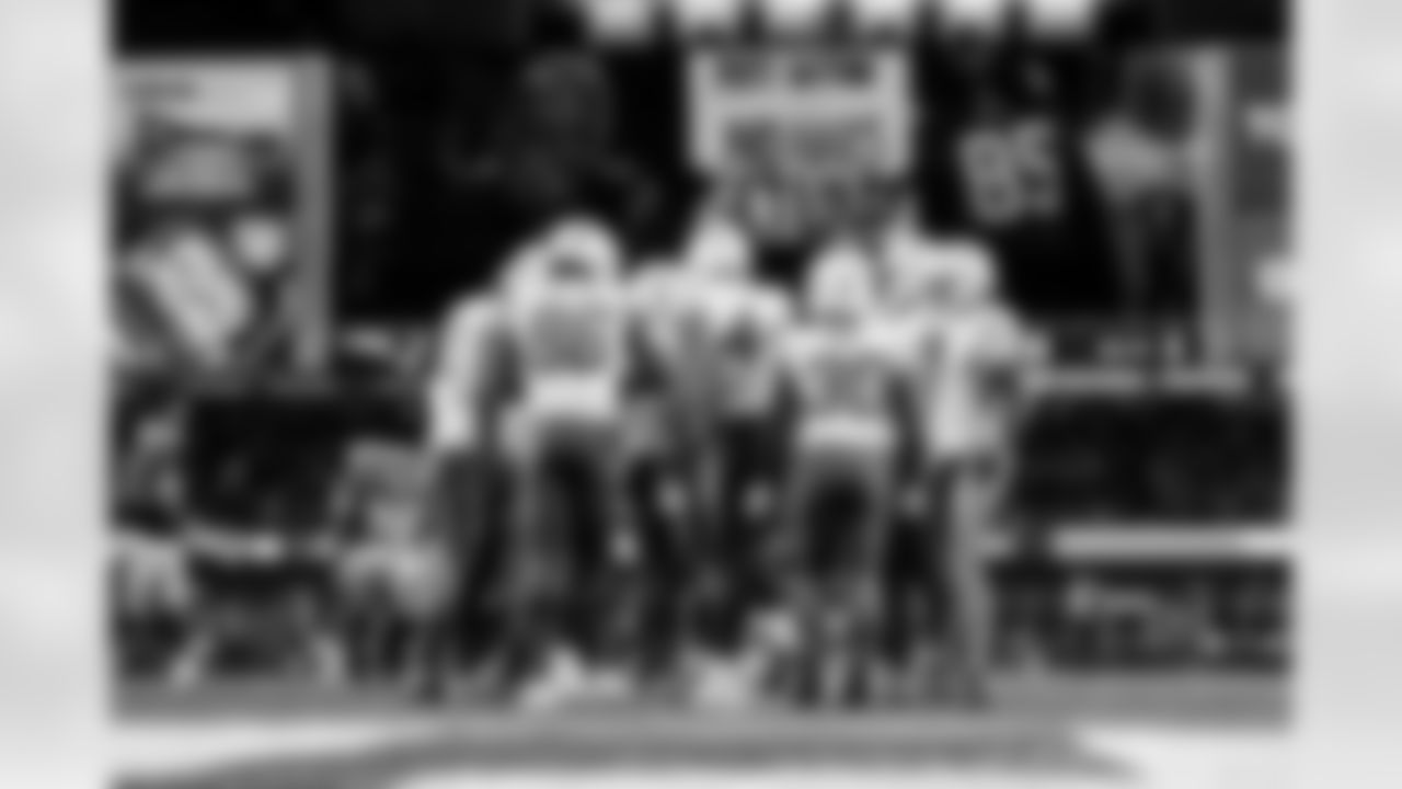 TE Oronde Gadsden (86), RB Kimani Vidal (30) and DL Scott Matlock (44)