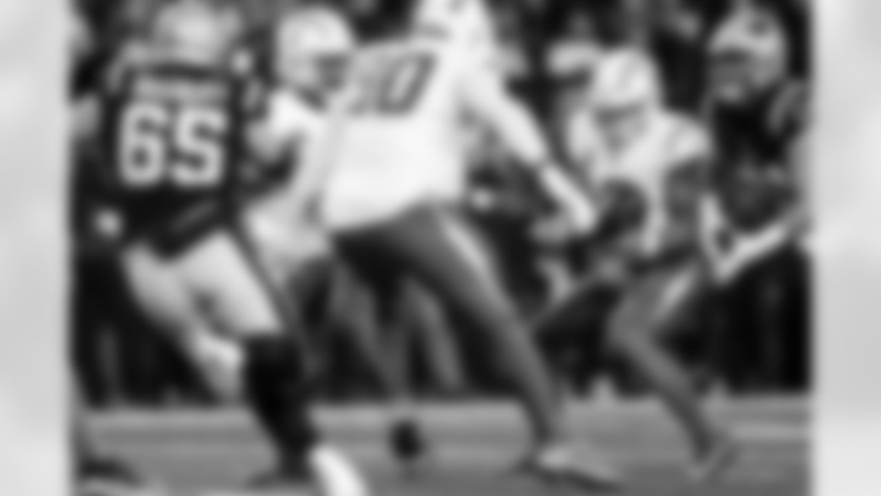 S Derwin James Jr. (3) and LB Daiyan Henley (0)